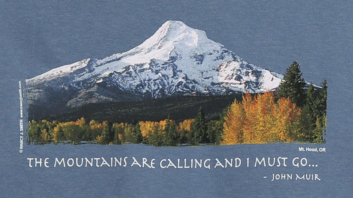 Detail view of shirt screen print featuring Oregon's Mt. Hood and caption "The Mountains are Calling and I Must Go...".